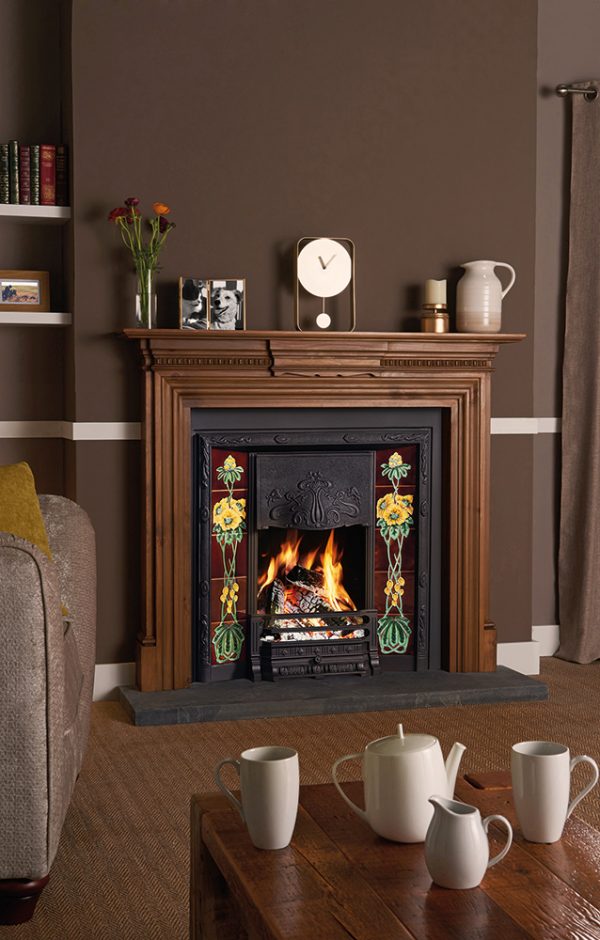 Stovax-Art-Nouveau-Tiled-Fireplace-in-matt-black-with-optional-cast-iron-back-with-2-x-Rhododendron-fireplace-tile-sets.-Shown-with-Chatsworth-wooden-mantel-in-waxed-antique-pine-lb