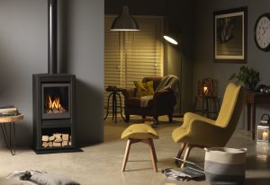 Valor Inspire Large Stove lifestyle right angle with logs